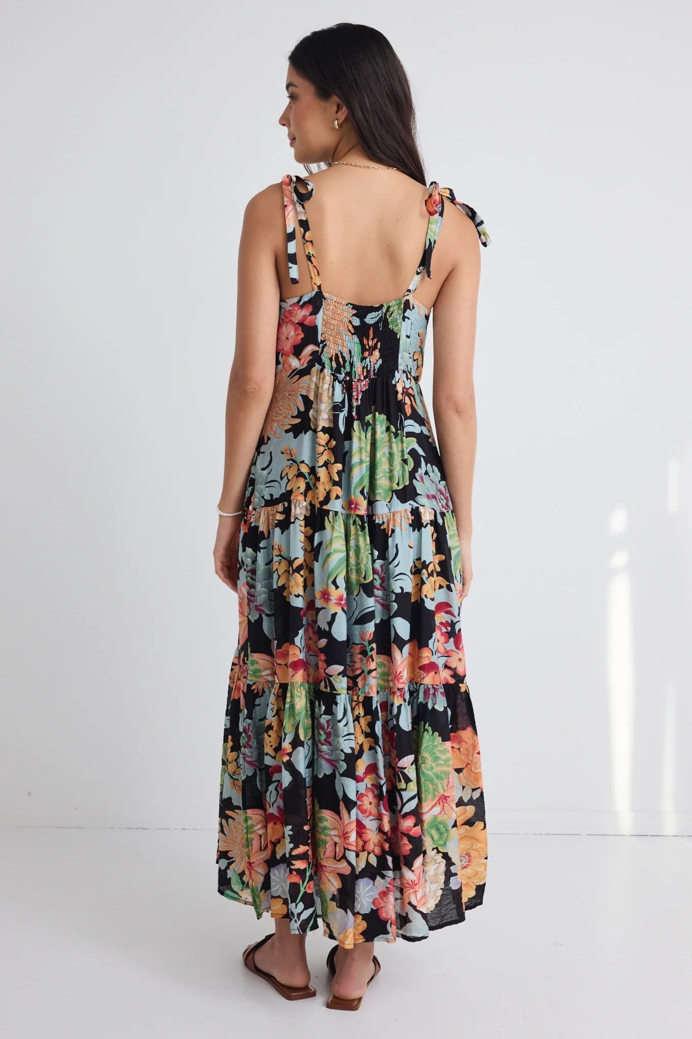 AMONG THE BRAVE NIMBUS TROPICAL BLACK STRAPPY TIERED MAXI DRESS - THE VOGUE STORE