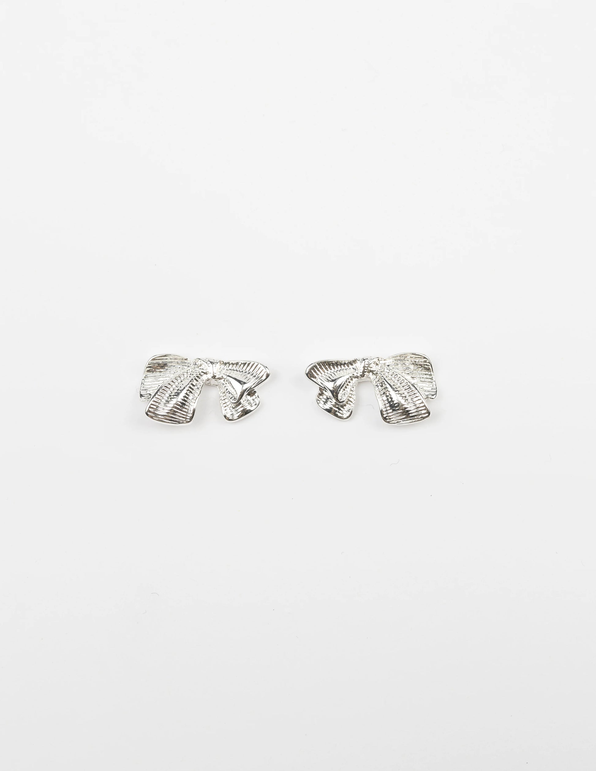 STELLA + GEMMA EARRING - SILVER BOWTIFUL - THE VOGUE STORE